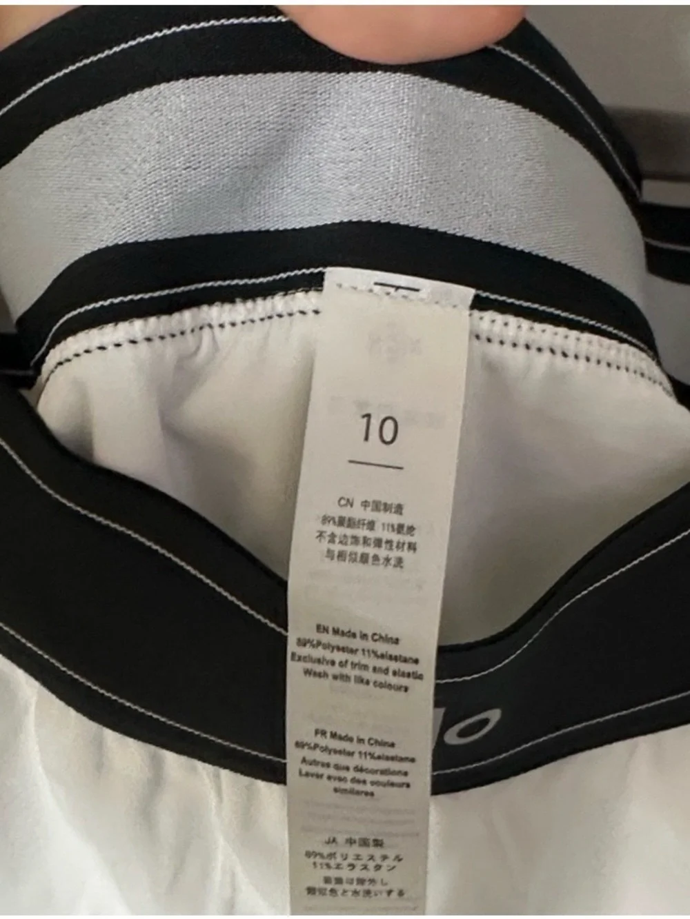 NWOT ALO Yoga Match Point White Tennis Skirt with Black Waistband Shorts
